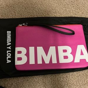 pink bimba y lola clutch like new I’m moving and selling most of my items